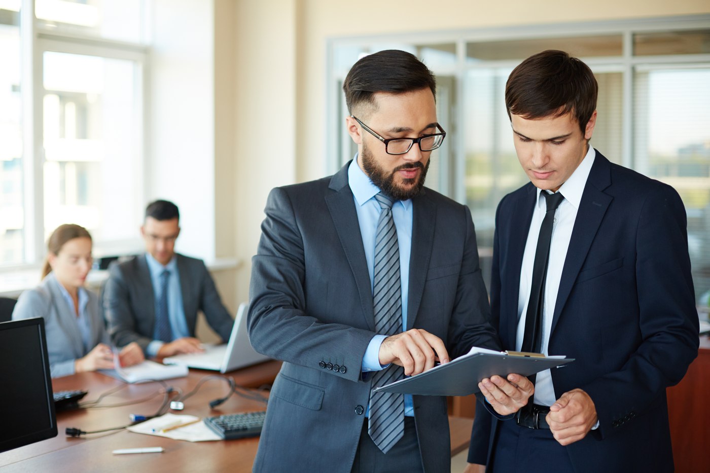 businessman-showing-the-changes-in-the-report